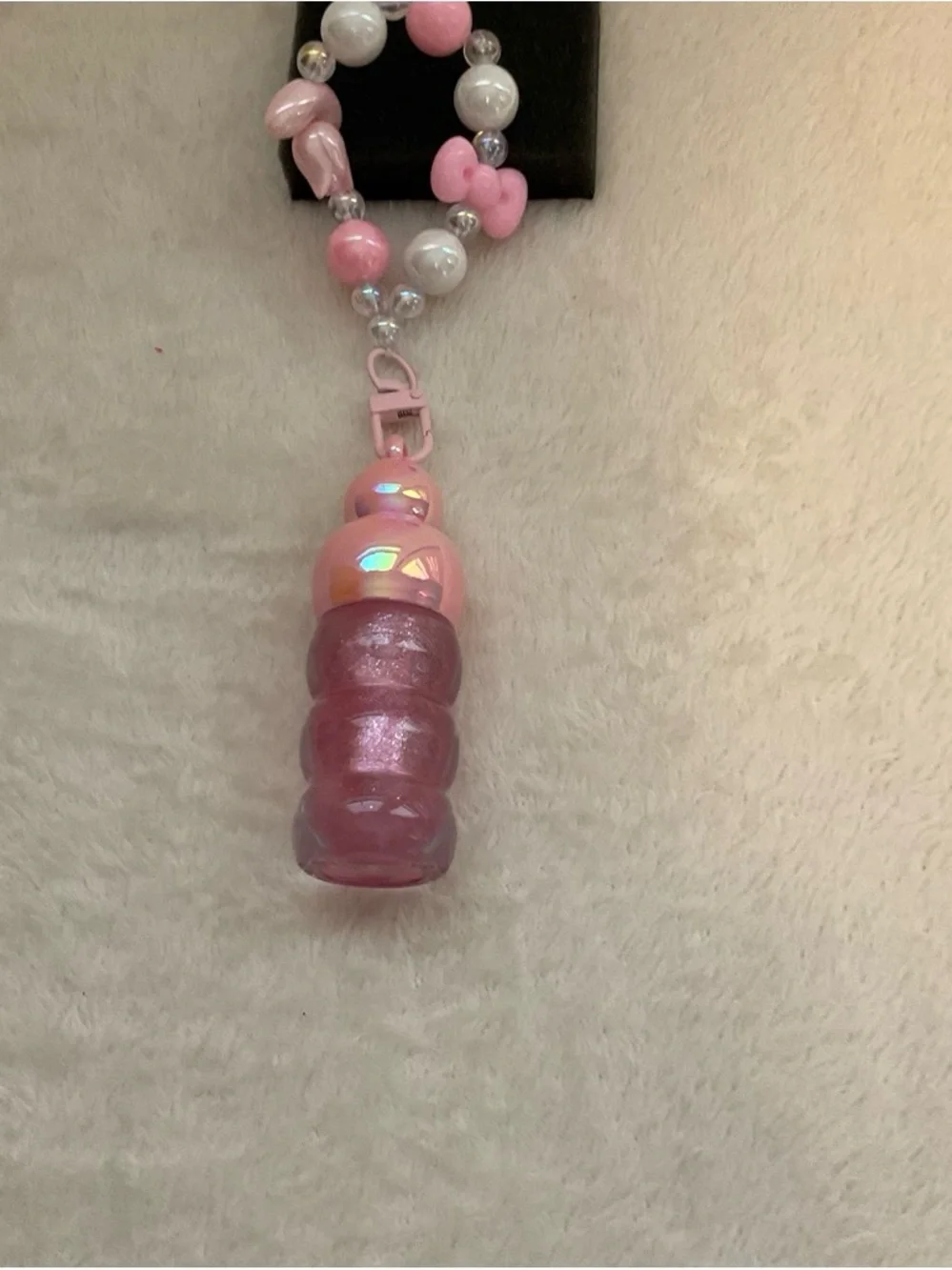 Bracelet with charms and Lip Gloss